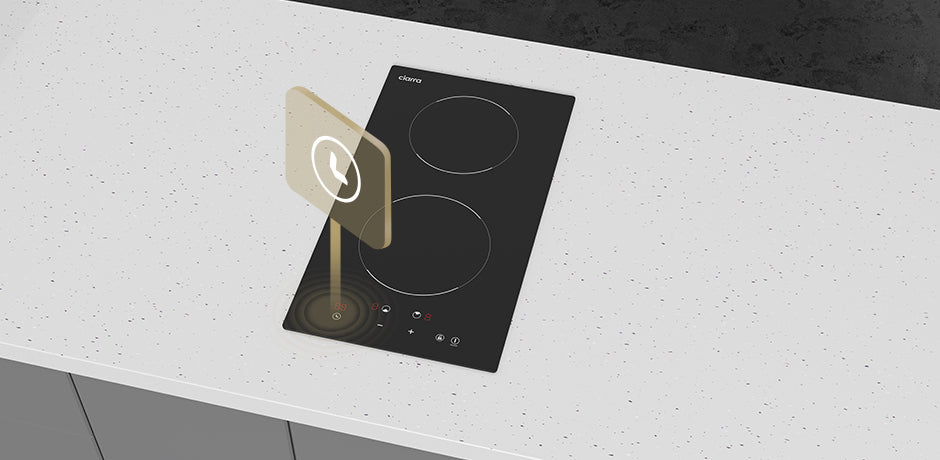 Induction cooktop on a white countertop with a smartphone icon overlay