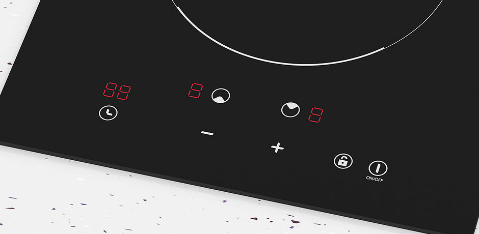 Induction cooktop with digital display and control panel on a white surface