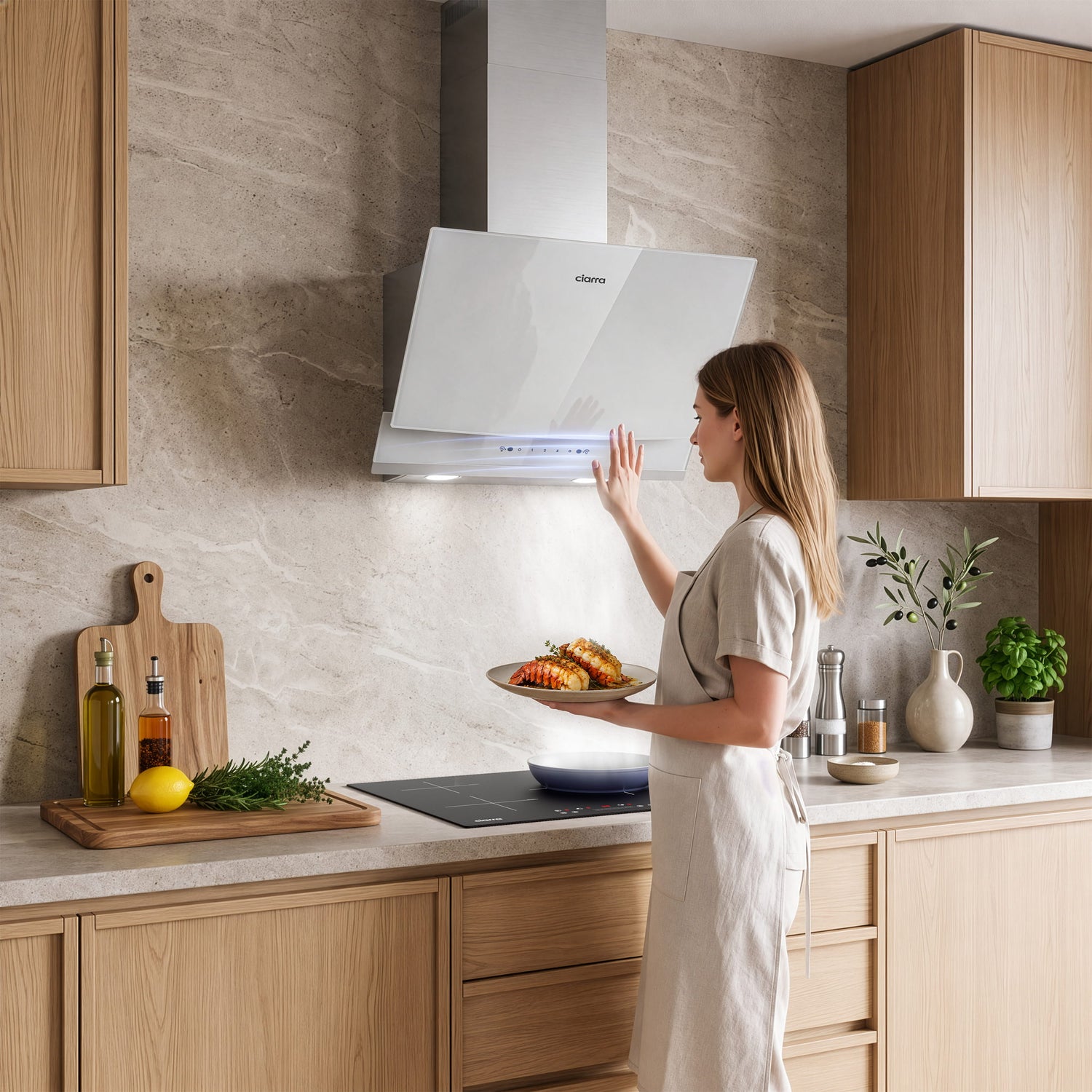 White 60cm angled wall‑mounted CIARRA CBCW6736A cooker hood, 710 m³/h extraction, hands‑free gesture control function, ducted & recirculating modes, hands‑on cooking demonstration in residential kitchen
