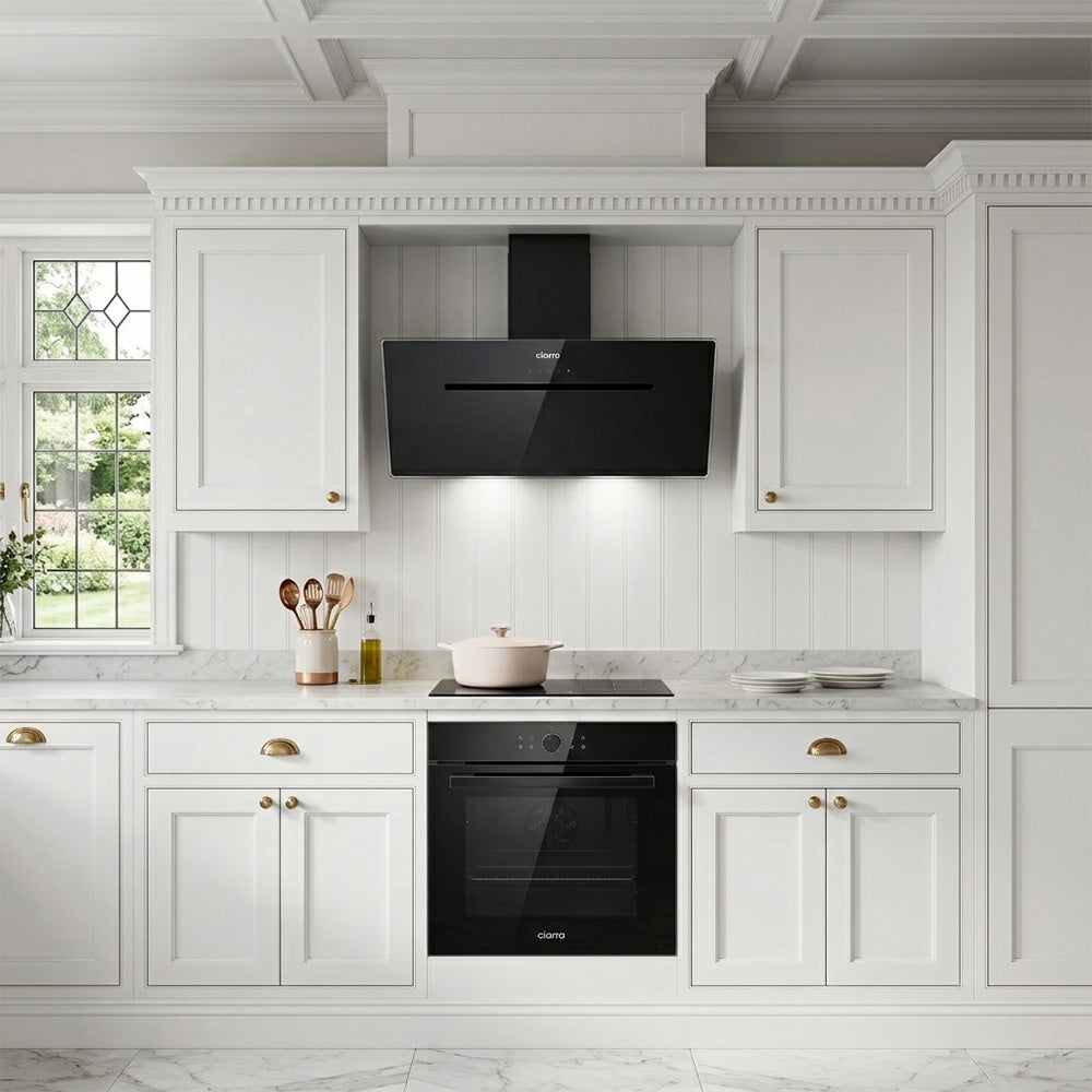 Ciarra 90cm black slant chimney hood with smooth glossy glass surface and modern minimalist design.