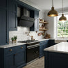 Ciarra 90cm black angled wall-mounted extractor hood showcased in a modern farmhouse kitchen design.